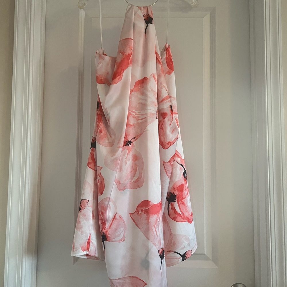 Floral necklace drape dress.